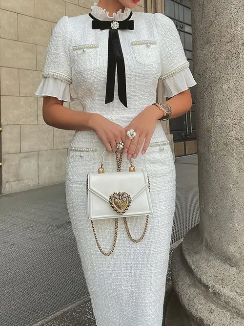 length dress with elegant pearl trim and velvet