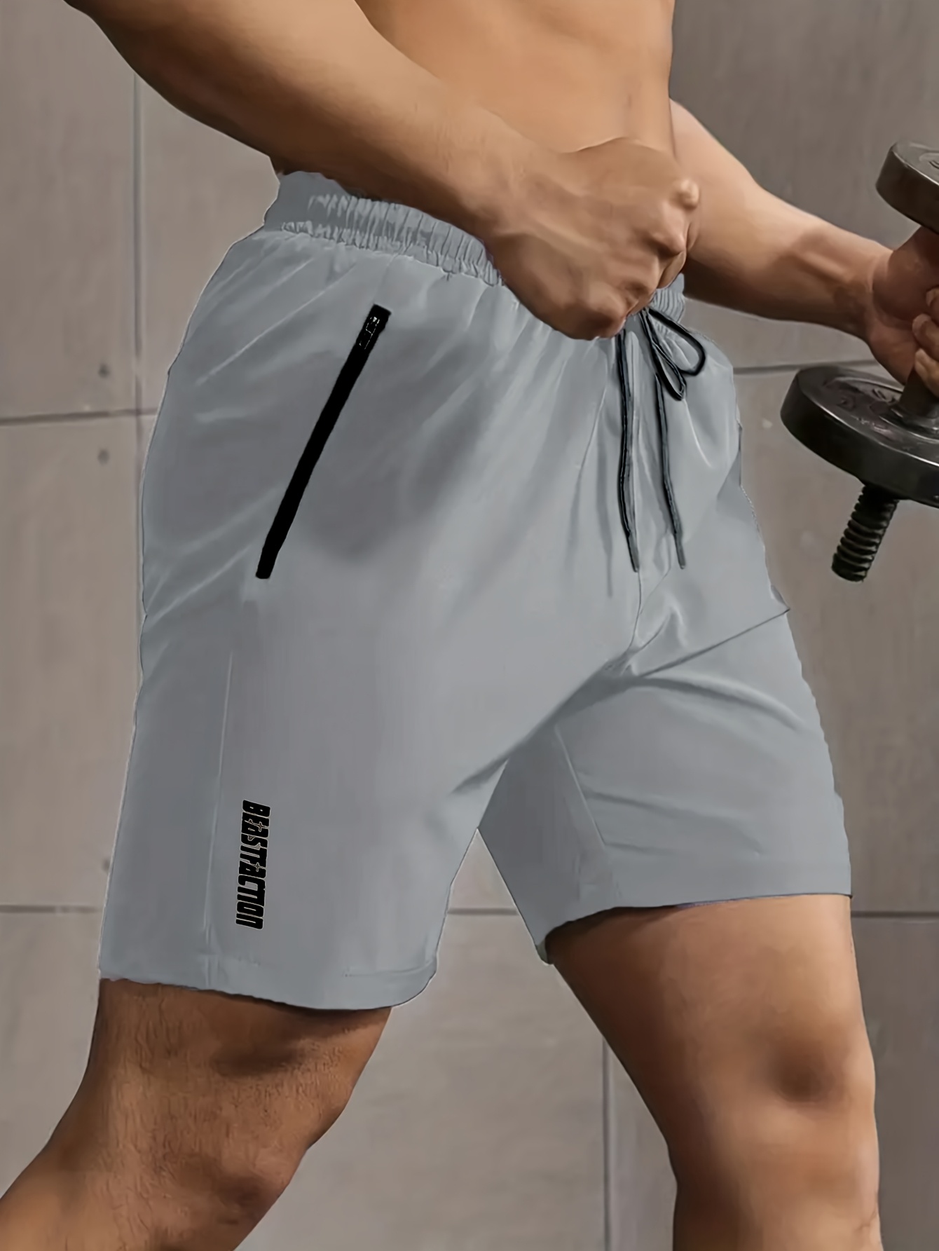 A Pair of Men'S Casual And Minimalist Style Comfortable Shorts, Featuring Letter Print Pockets And Drawstrings, Suitable for Summer Outdoor Fitness Wear, Quick-Drying Comfortable Shorts with Slightly Stretchy Elastic Waistband And Drawstring, Ideal for Gym Workouts in The Summer.