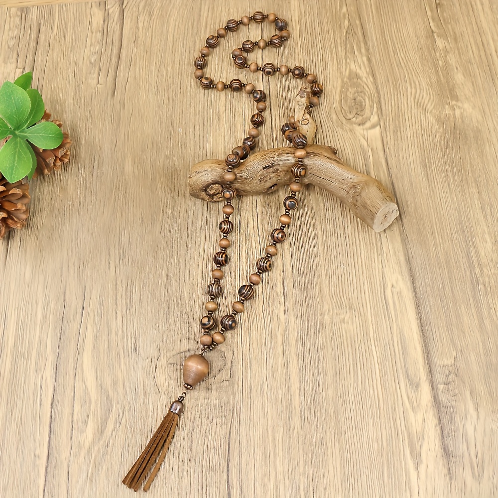 

Tribal Style Beaded Necklace With Color Gradient Wooden And Pu Leather Tassel, Vintage And Ethnic Fashionable Jewelry, Unisex, Perfect For Daily Wear, Travel, And Street Style Outfits