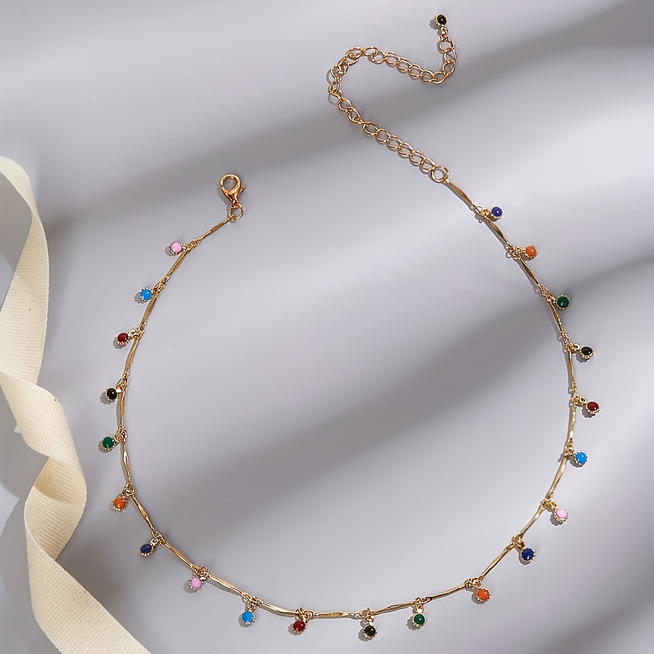 A Stylish And Elegant Bohemian Necklace Featuring Colorful Round Ball Tassel Pendants
