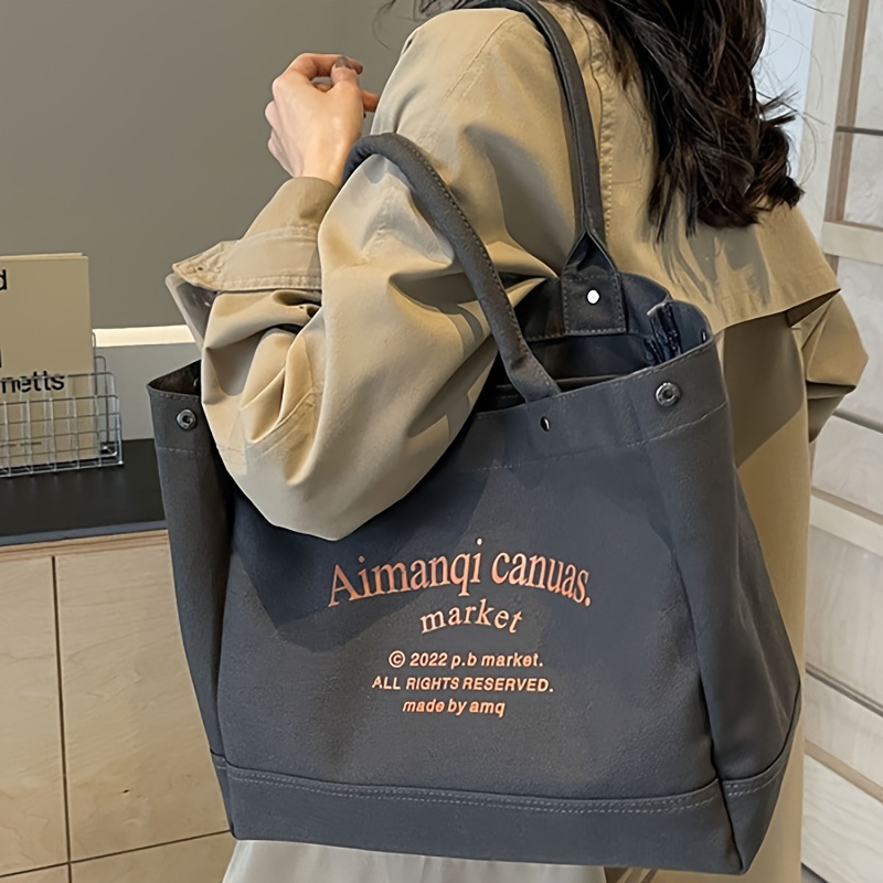 

1pc Durable Canvas Tote Bag, Sports-inspired, Thick Fabric, Versatile Literary Style, Student Commuter Bag, Portable Large Capacity Handbag