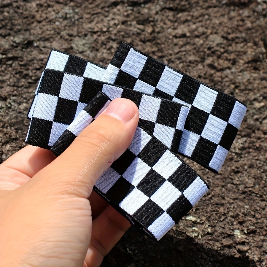 Thin And Elastic Black And White Checkered Wristbands That Provide A Fit For Basketball And Soccer, And Style