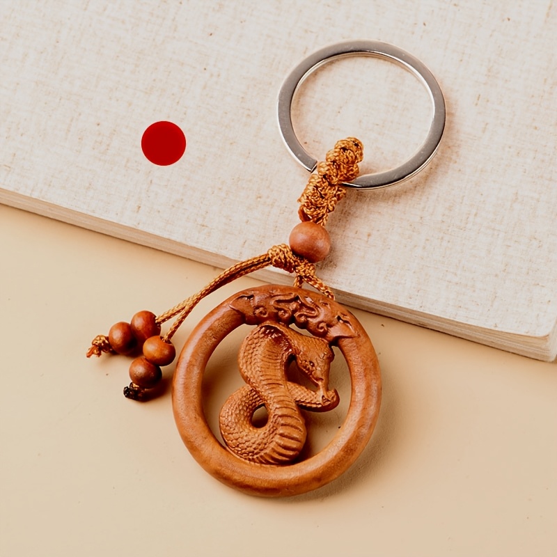 

Hand- Wooden Keychain, Fashionable Double-sided Snake Pendant, Snake Charm, Peach Wood Keyring For Car Keys, Safety Amulet Jewelry