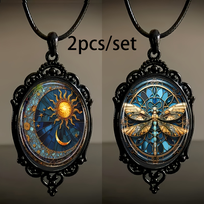 

2pcs/set Fashion Elegant Sun And Moon And Dragonfly Pattern Black Frame Glass Necklace Romantic Gift Jewelry