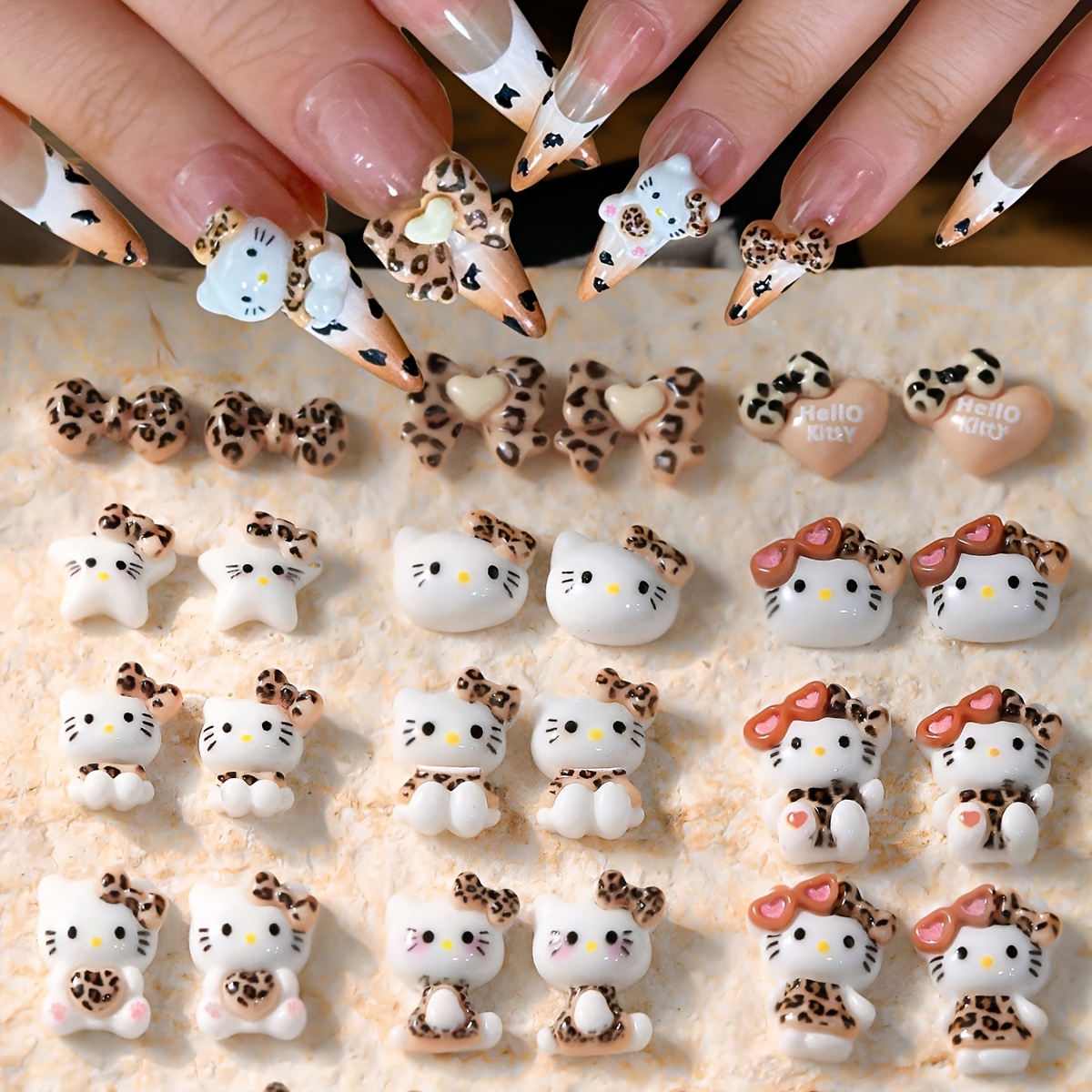 

Sanrio aléatoire 20pcs/ de nail art de dessin imprimé léopard décoration d'automne DIY bijoux d'ongles en résine 3D, Hello Kitties Cinnamorolls My Pochaccos Pom Pom Purins