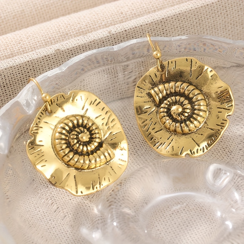 Copper Earrings Featuring Hand-carved Designs And Beach