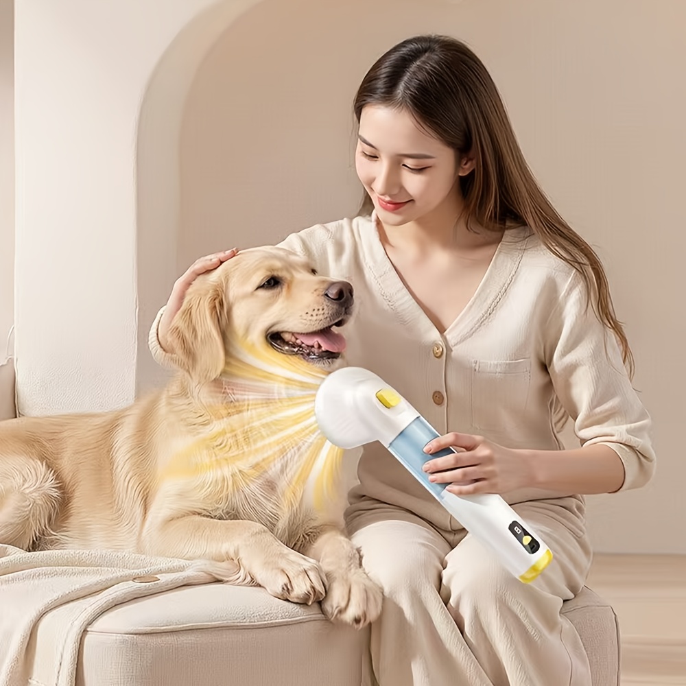 a pet grooming and hair vacuum device that automatically   cat fur from carpets and beds 2