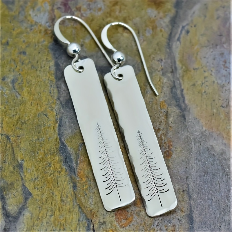 

A Pair Of Minimalist Rectangular Pendant Earrings With Pine Tree Pattern, Perfect For A Bohemian Party Gift