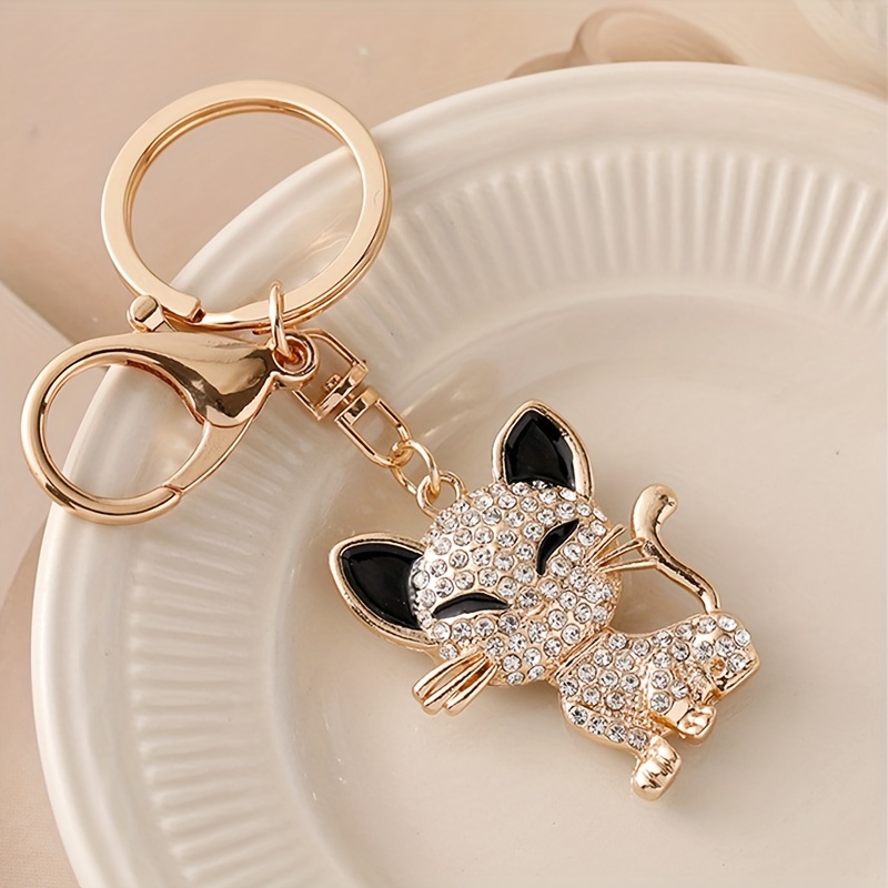 

Sparkling Kitten Rhinestone Keychain - Golden-tone Alloy Charm For Women's Bags & Car Accessories, Cute Cartoon Design, Lobster Clasp, Perfect Valentine's Gift