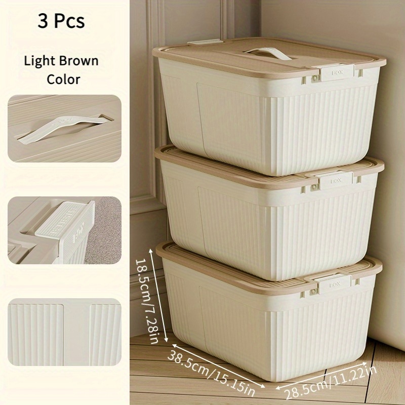 three lidded plastic storage boxes stackable organizing containers with snap seals and handles suitable for home storage for in closets kitchens bedrooms and living rooms in cream yellow measuring 38 5 28 5 18 5cm Product details 7