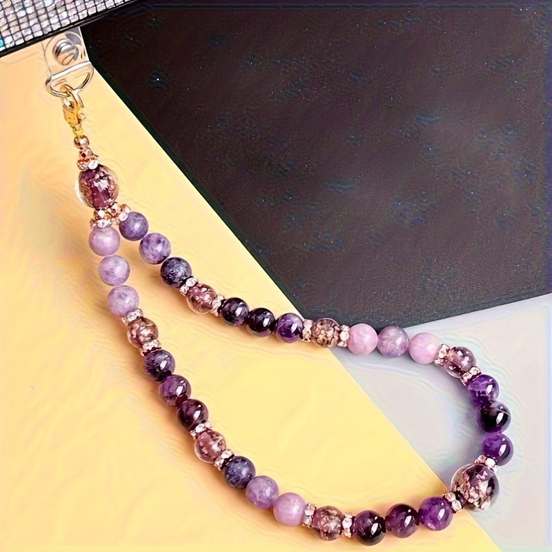 TEMU 1pc Bracelet de téléphone en verre phosphorescent violet foncé avec chaîne, ce bracelet de téléphone est doté de perles en verre fluorescentes
