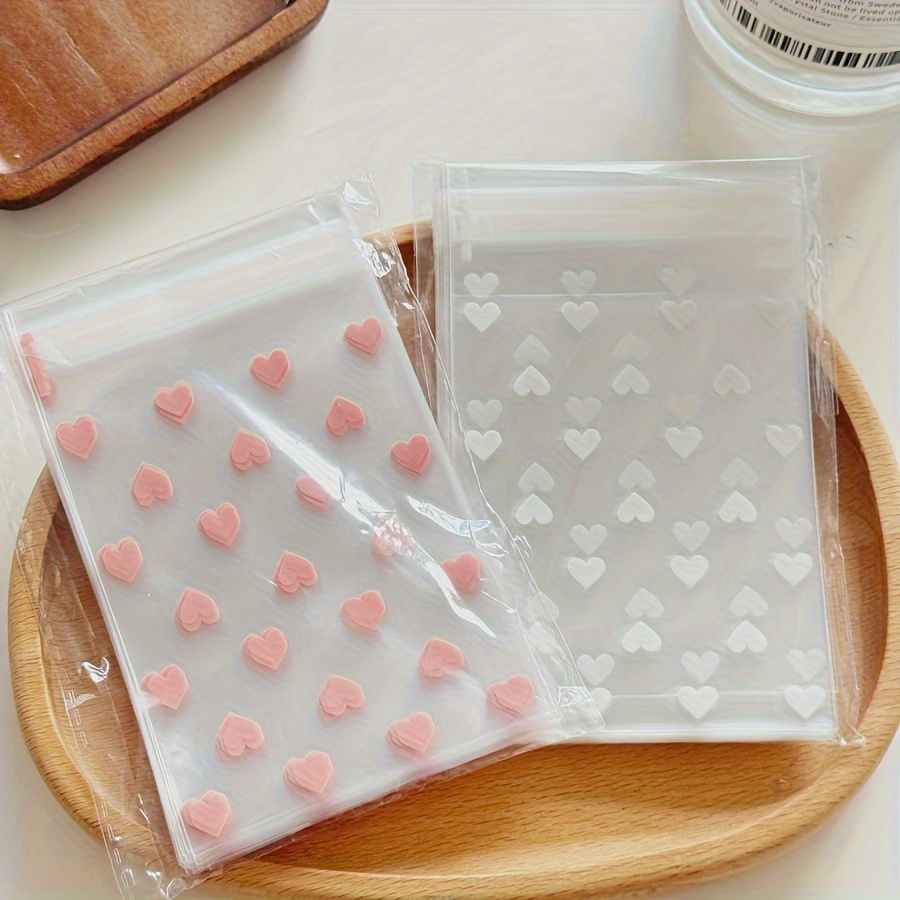 

50-pack Self-adhesive Plastic Bags With Heart Pattern, Stain Resistant, Disposable, Multipurpose Gift Packaging Material