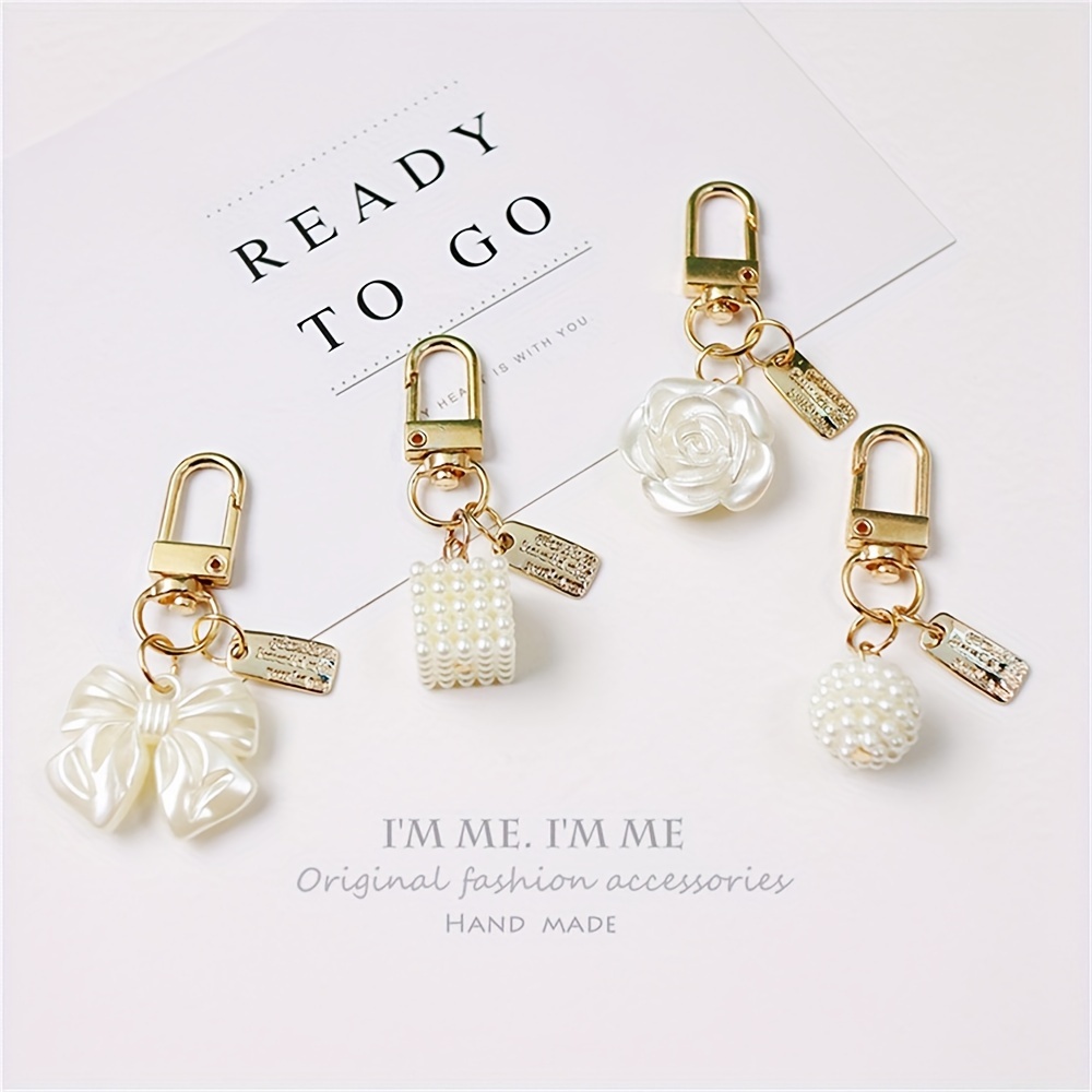 

Elegant 4pcs Pearl Bow Keychain Set - Chic Alloy Car & Bag Charms For Women, Perfect Birthday Gift