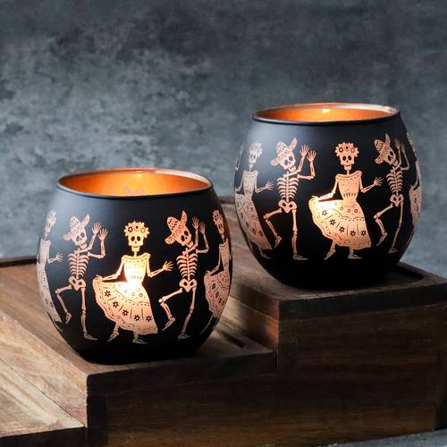 a pair of dancing skeleton couple candlesticks for of the dead featuring two glass halloween party decorations with sugar and floral designs ideal for themes weddings christmas easter thanksgiving