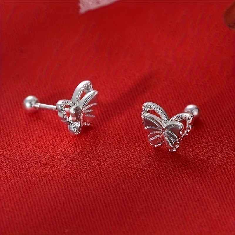 a pair of ladies fashionable hollow   stud earrings with 925 spiral silvery   featuring a silvery plating for a minimalistic light luxury look suitable for daily wear parties vacations and making great gifts Product details 2