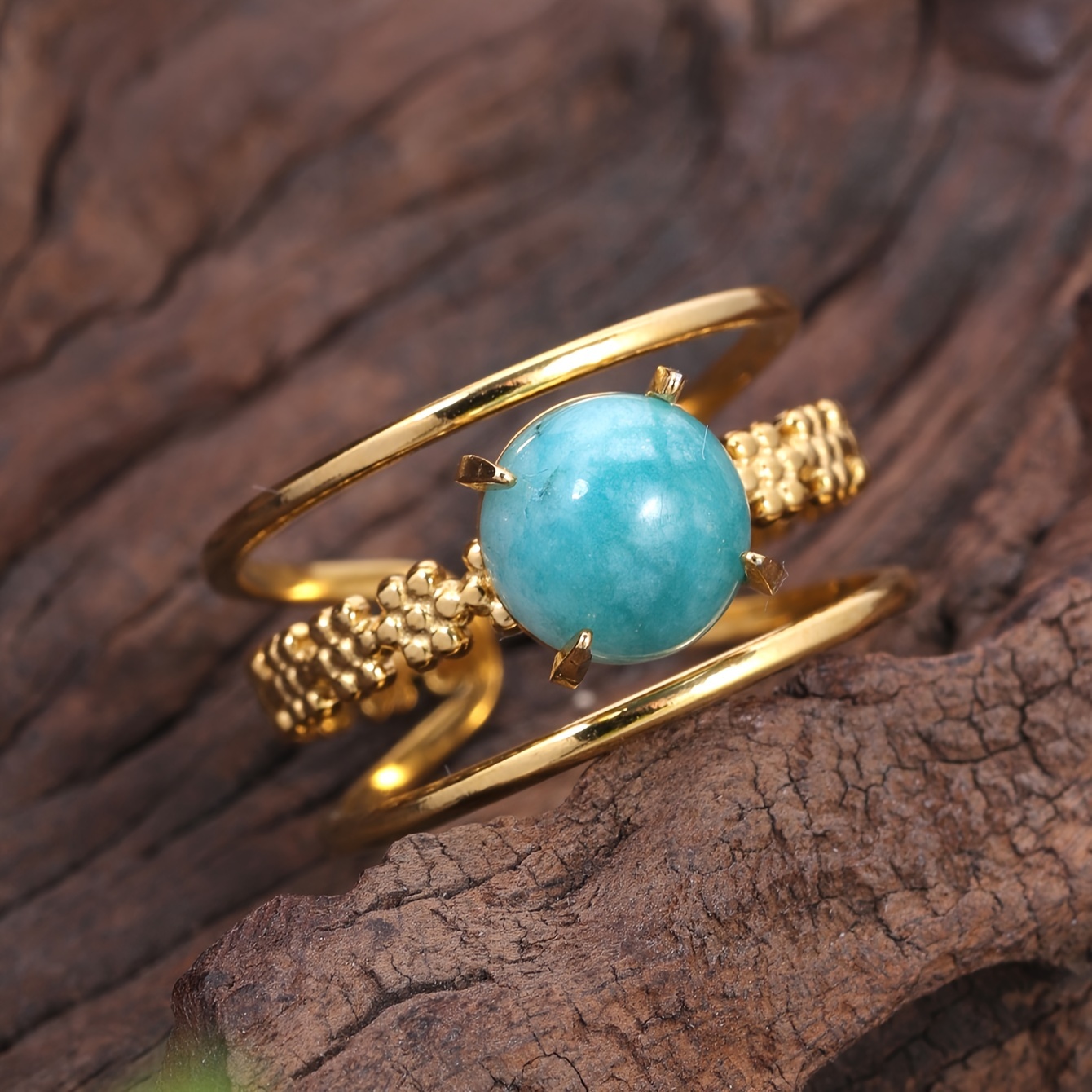 טבעת פתוחה אלגנטית מפלדת אל-חלד בגוון זהוב עם מרכז טורקיז לגיאומטרי - תכשיטים ואירועים למיני, תכשיטים ואירועים. תכשיטי חתונה