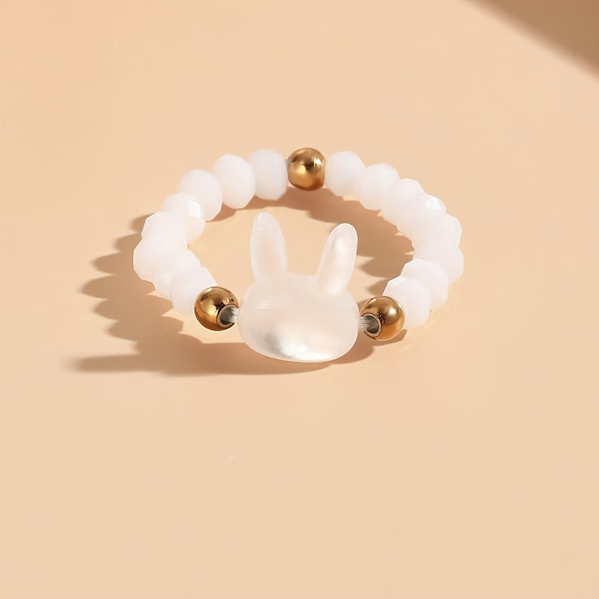 Beaded Stretch Ring with Rabbit Charm Golden Accents