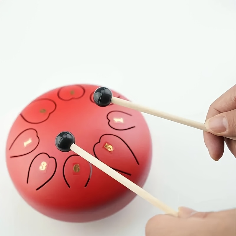 

2 instruments de percussion en caoutchouc pour débutants avec des mailloches en bois, idéaux pour les batteurs et les pratiquants de musique