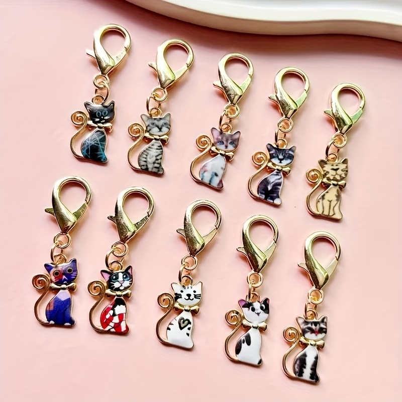 Image of 10pcs Of Cute Cartoon Cat Drip Oil Pendants, Pet Keychains, Clothes Backpacks, Car Key Pendants, Metal Keychains, Keychains, Mobile Phone Chains