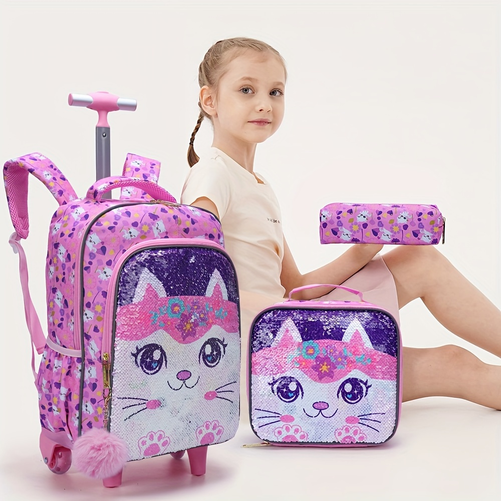 

A Pink Rolling Backpack For Girls Featuring A Cute Cartoon Kitty With A Sequin Design, Suitable For Elementary Students. This 17-inch Wheeled School Bag With A Lunch Box And A Pencil Case.