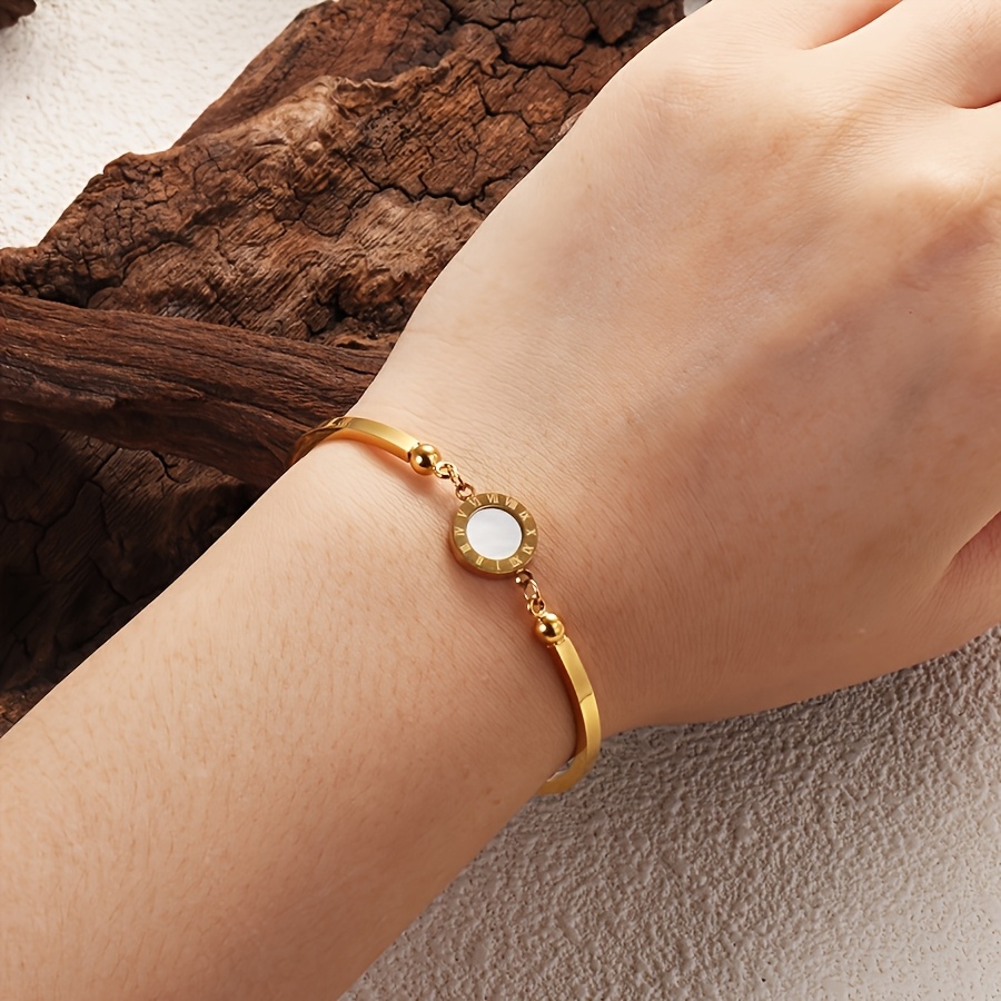 A Roman Numeral Bracelet Available in Four Colors: Black, White, Red, And Green. Made of Stainless Steel, This Classic And Stylish Jewelry Piece Is Designed for Women