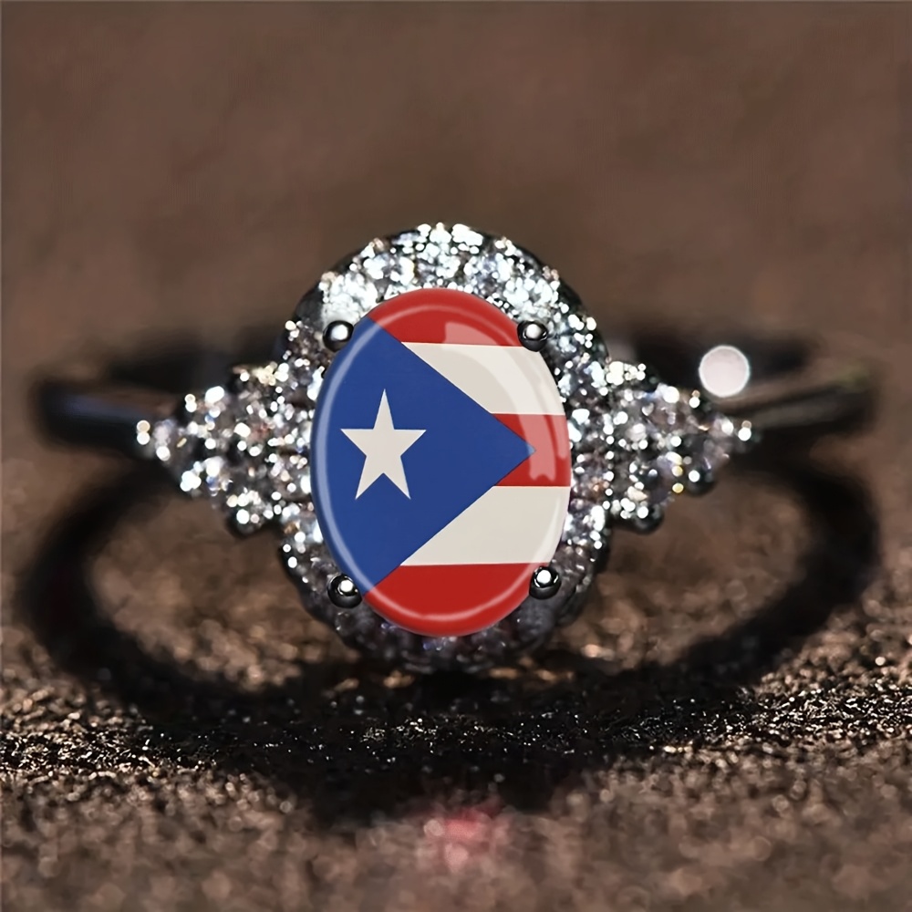 An Engagement Ring Featuring A Sparkling Oval Puerto Rican Flag Emblem, With Glitter - A Chic And Piece Of Jewelry, Use, Celebrations, And As A Gift For Valentine's Day