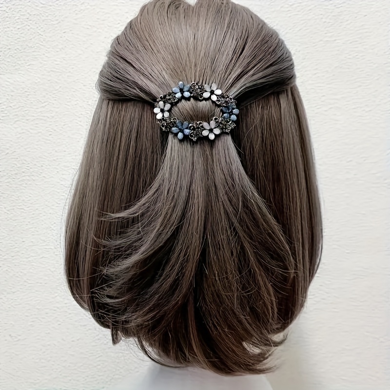 

Elegant Floral Vintage Hair Clip That Is Perfect For Ponytails And Braids