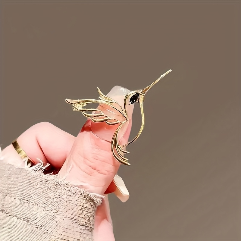 TEMU 1pc Elegant Hollow Bird-shaped Brooch With Golden Feathers And Black Gemstone Eyes - Women's Exquisite Animal Pattern Jewelry, Versatile