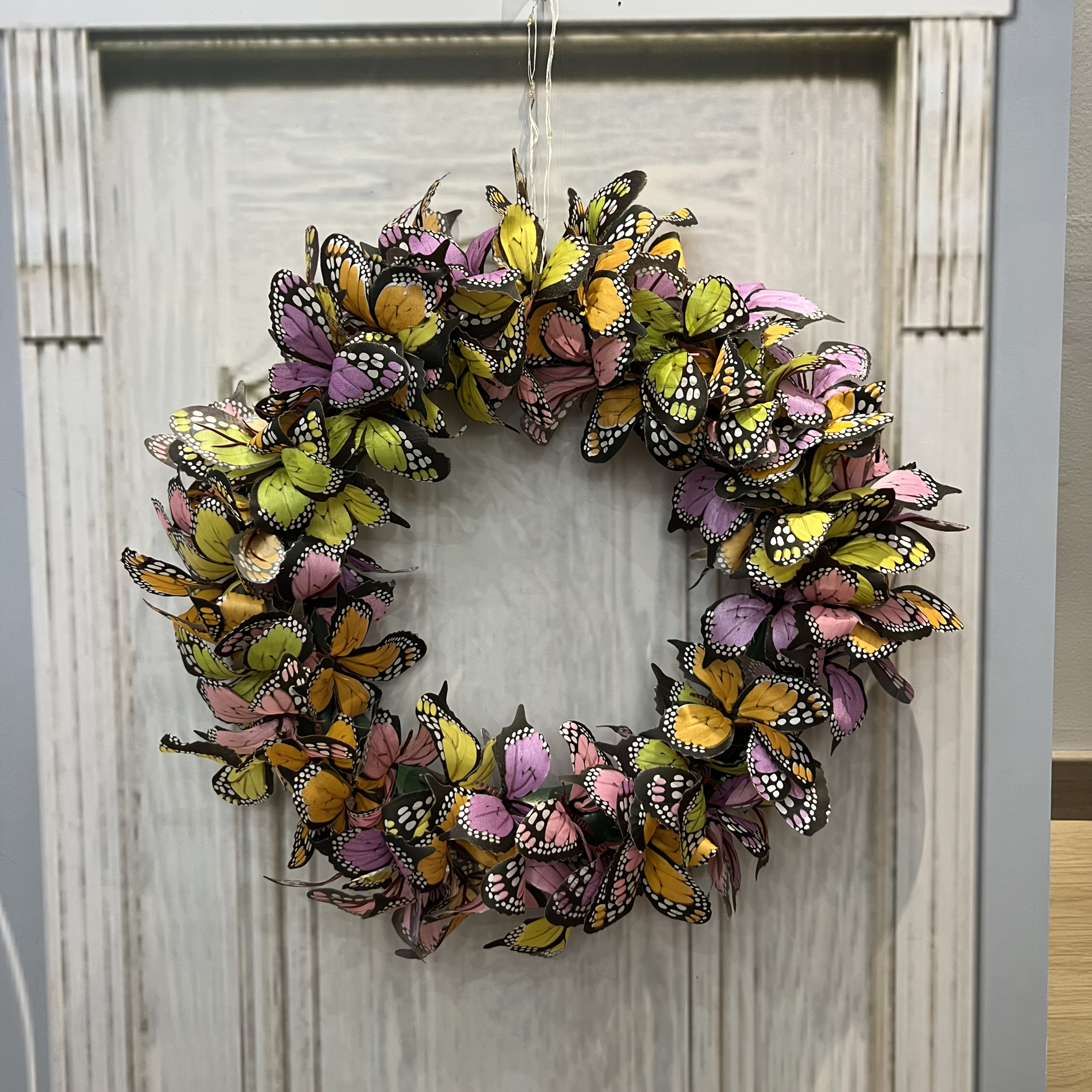 

A Wreath Featuring Beautiful Butterflies, A Seasonal Decoration For Door, Wall, Window, Porch, Cottage, And Garden.