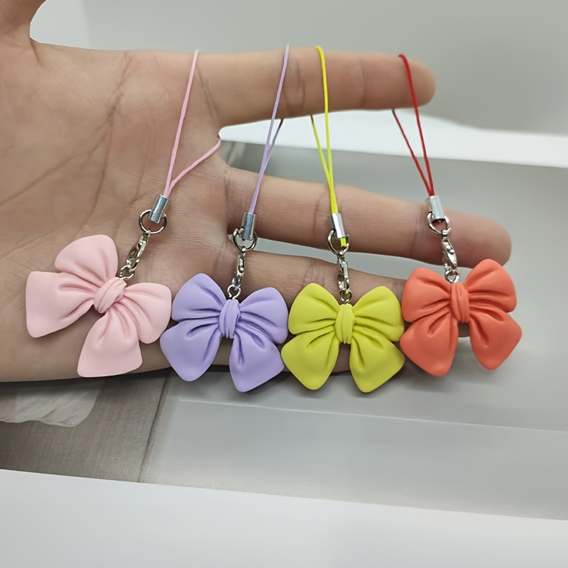 

1pc Breloque pendentif en ABS coloré en de grand nœud, accessoire multi- pour téléphone portable, sac à dos, portefeuille, porte-clés.