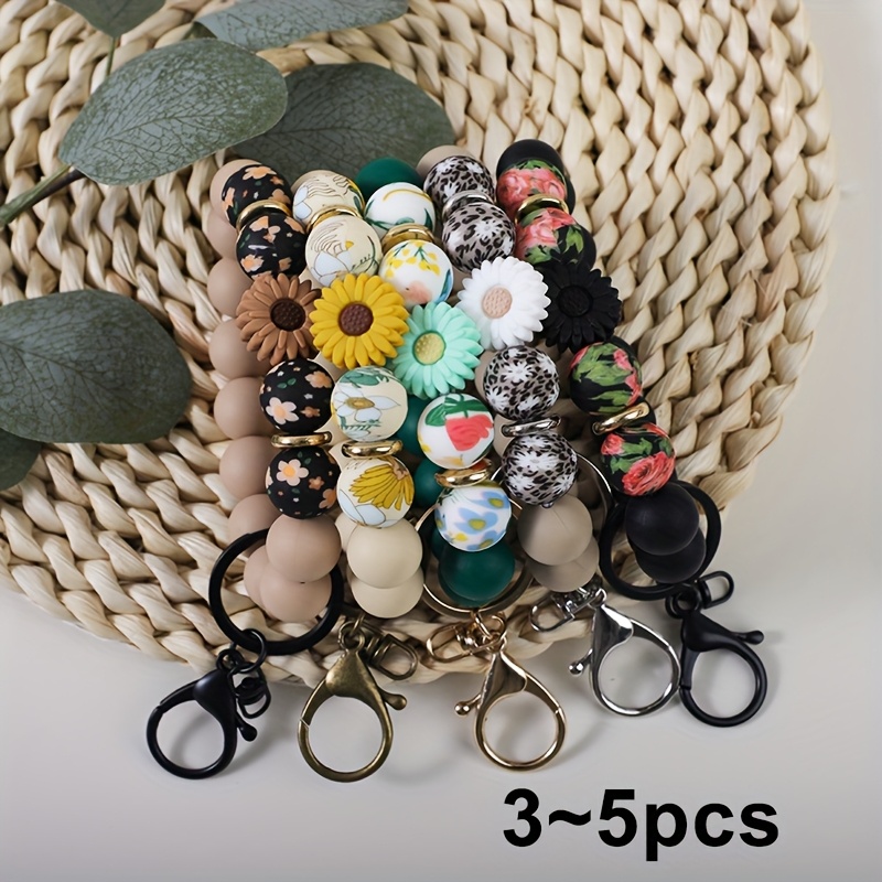 

3-5pcs Daisy Silicone Bead Wrist Keychain, Printed Silicone Bead Keychain, Women's Backpack Accessories, Hanging Ornaments, Gifts For Friends