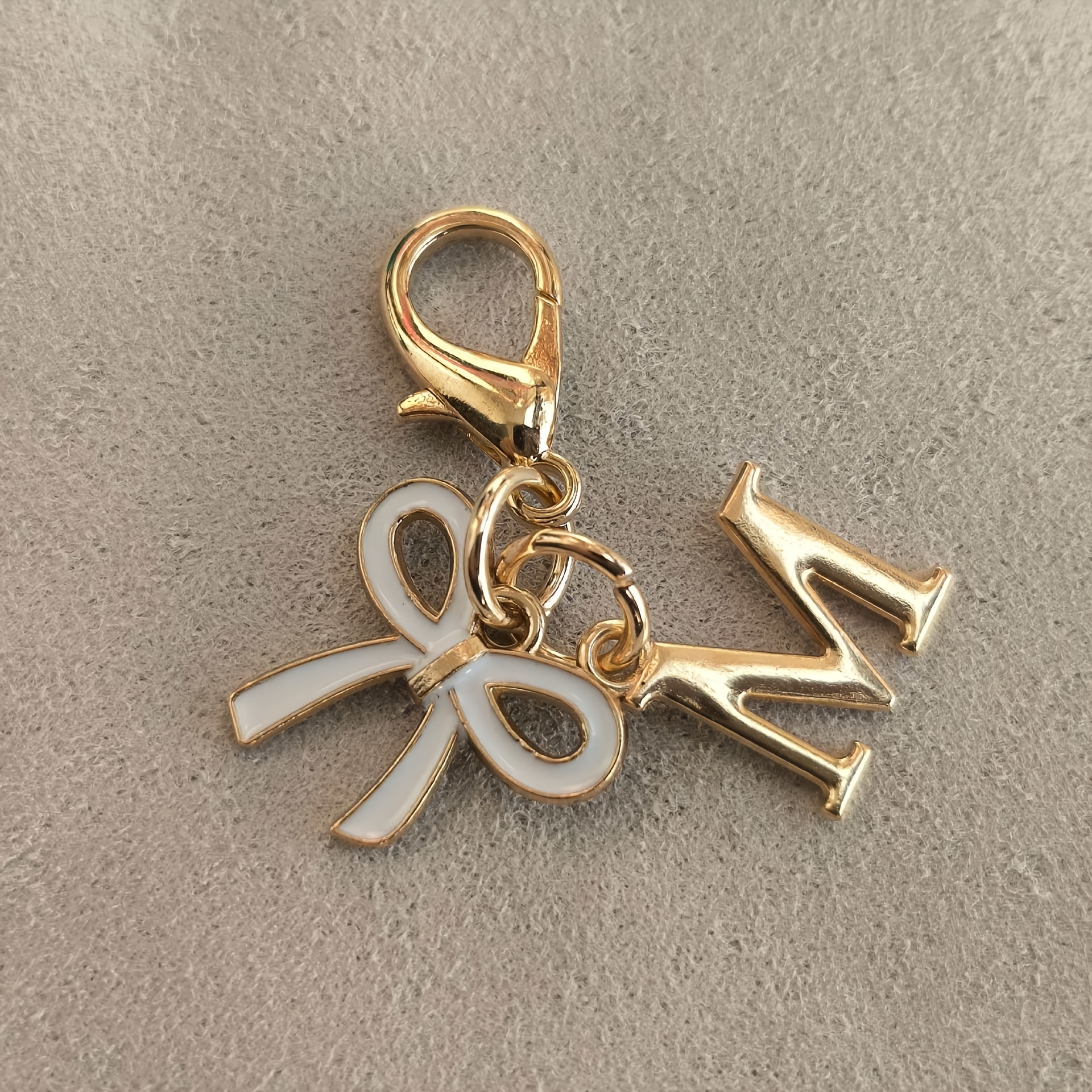 TEMU Weißer Schmetterling Gold A-Z 26 Buchstaben Schlüsselanhänger/Tasche Schuhe und Kleidung Dekorationsanhänger