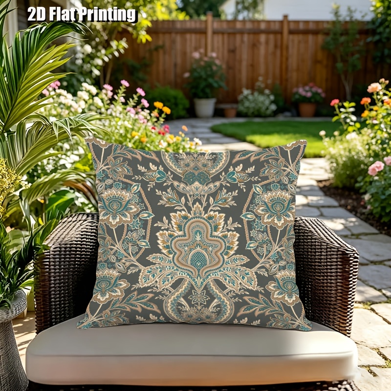 2D Flat, Terrace Cushion Cover, 1pc 18X18 Inches Square Pillow Cover, A Dark Gray Background Features an Intricate, Symmetrical Pattern with Teal, Cream, And Golden Floral Motifs, Including Large Central Blooms, Leaves, And Scrollwork