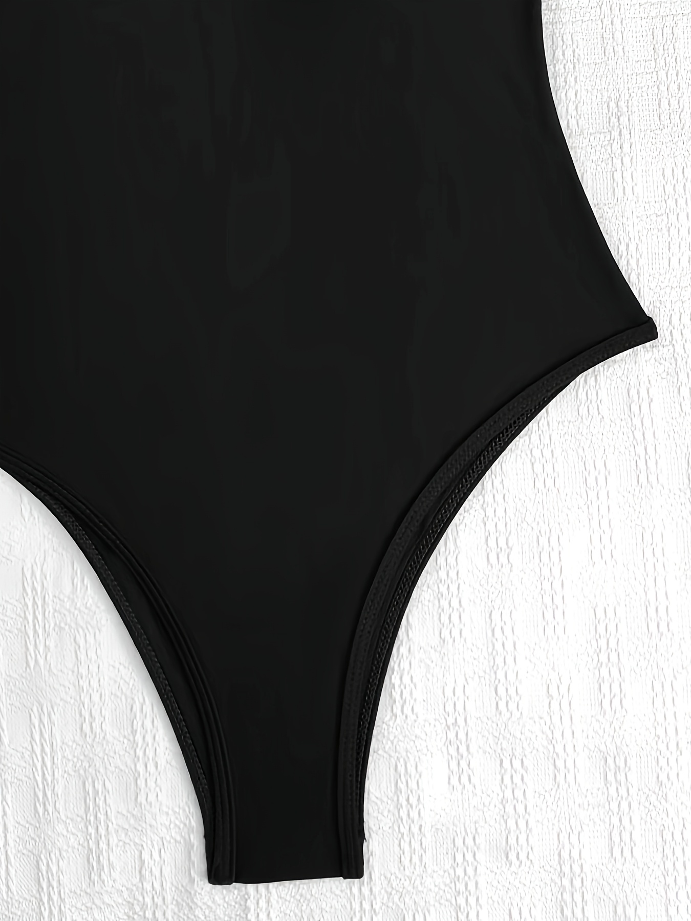 New Black One-Piece Swimsuit for Women, Sexy European And American Style with a V-Neck, Backless, Off-Shoulder Design, Perfect for Hot Springs, Surfing, Diving, Vacationing, And Beach Outings.