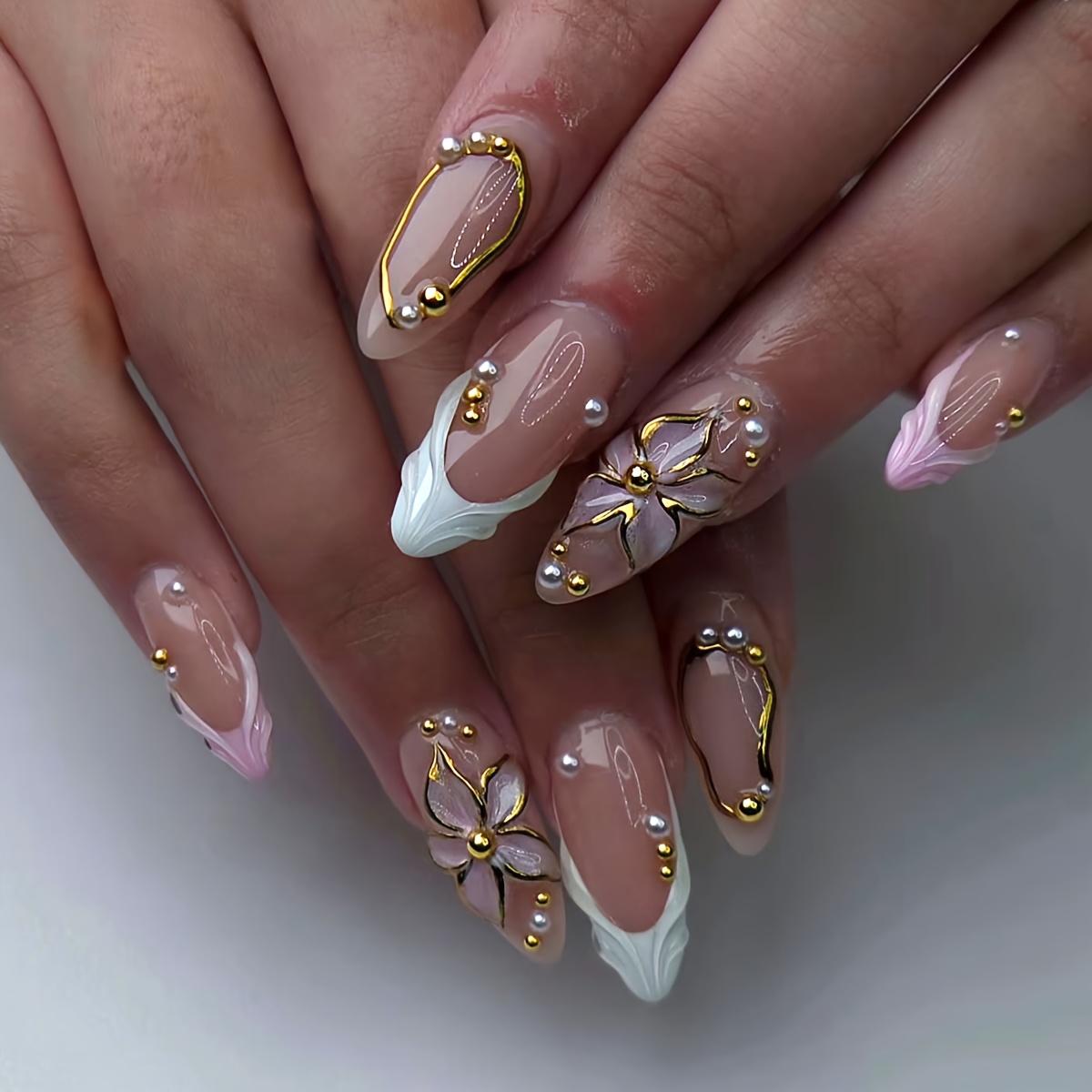 TEMU 24pcs Light Luxury Metallic Line 3d Floral Fake Nails, Medium-length Stiletto Shape. Features A Soft Nude Pink Base With Creamy White/light Pink