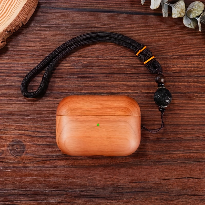 A Protective Case for Airpods, Compatible with Models 1, 2, 3, 4, And Pro 2, Made of Wood And Designed for Wireless Headphones. It Includes a Lanyard And Offers a Variety of Wood Options, Making It a Great Holiday Gift