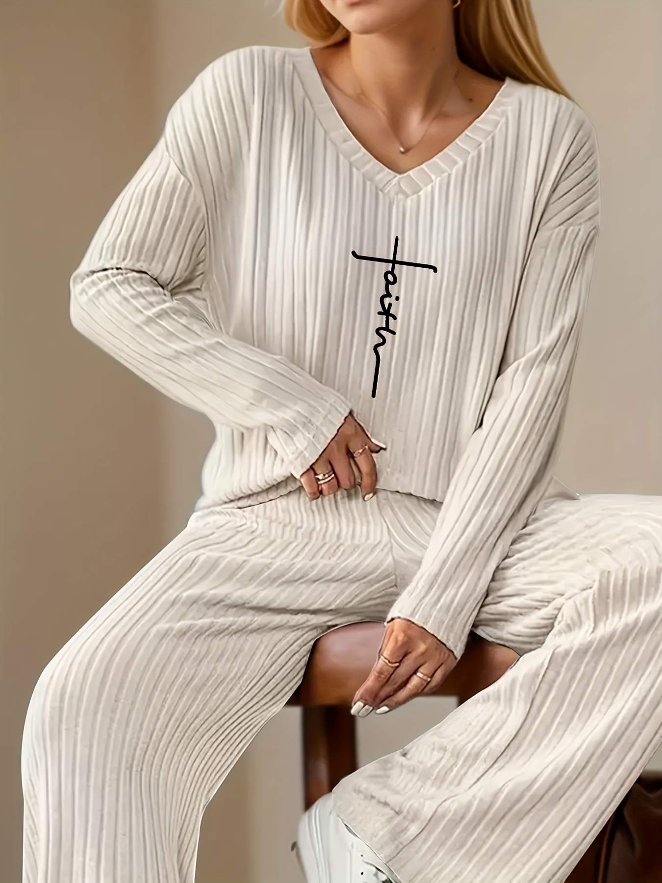 Model sitting, showcasing fit of the set, image 6