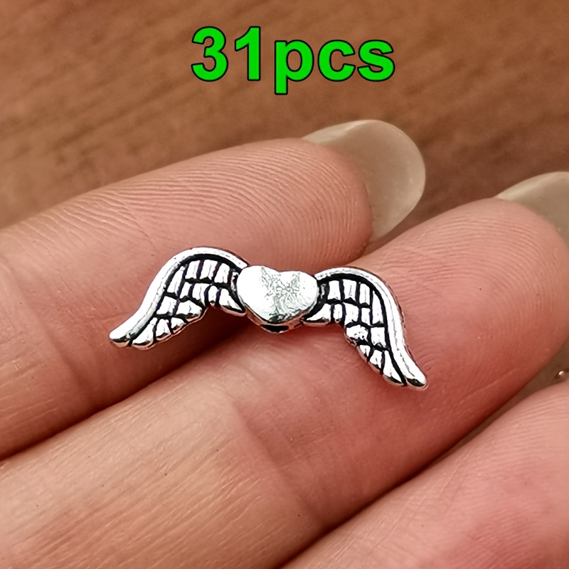 TEMU Lot de 31 perles à épingle à œil de cœur avec aile, breloques pendentifs de mode pour femme, entretoises pour , perles isolées, pour collier,