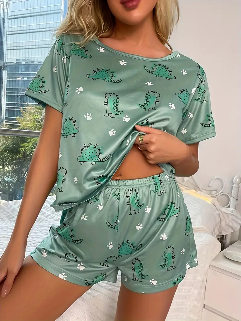 a cute dinosaur print pajama set for of polyester knitted fabric featuring collar short sleeved top and shorts for casual wear in comfortable relaxing and suitable Product details 0