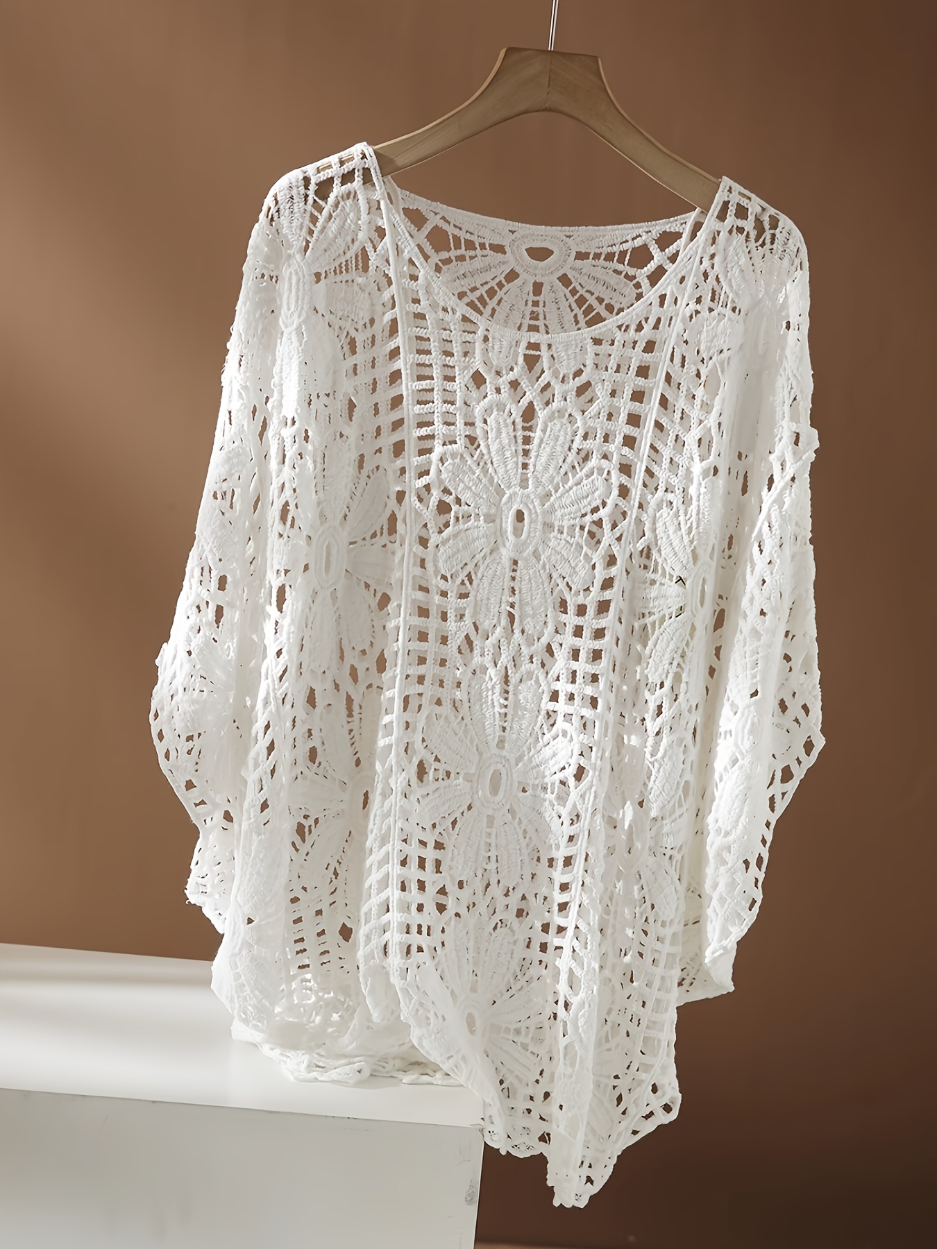 item picture   style openwork embroidery round neck batwing five sleeve pullover blouse