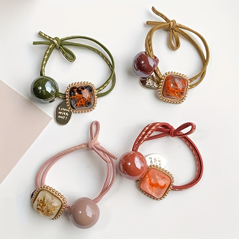 E-shop Neues 4-teiliges, gemischtes Farbset mit stylischen und niedlichen, hochelastischen Haargummis für Damen-Pferdeschwänze und Duttfrisuren,
