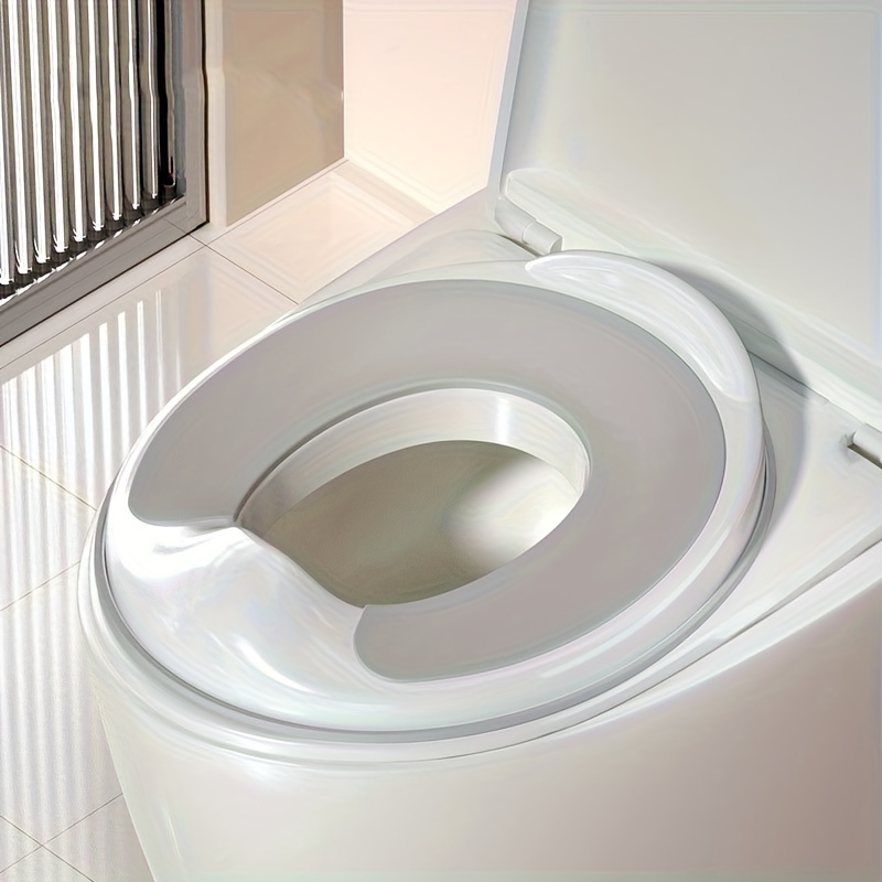 Image of Ergonomically Designed Potty Training Seat, Comfortable Toilet Adapter For Children, Durable Plastic, Universal Size, Multiple Colors