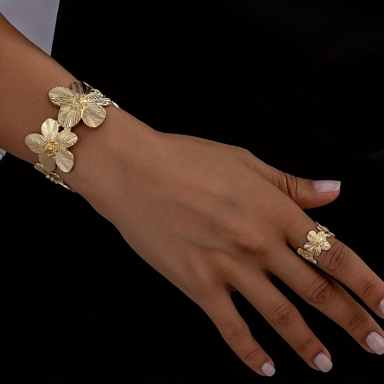 Set Featuring A Retro European And Flower-patterned Golden Bracelet And A Chunky Ring, Perfect For Stylish Summer Wear. This Durable Set Is Ideal For Women To Wear On A Or During Celebrations
