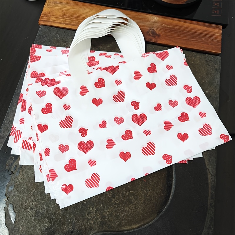 

50-pack Heart Pattern Plastic Gift Bags - Valentine's Day, Birthday & Retail Packaging, White Bags With Design