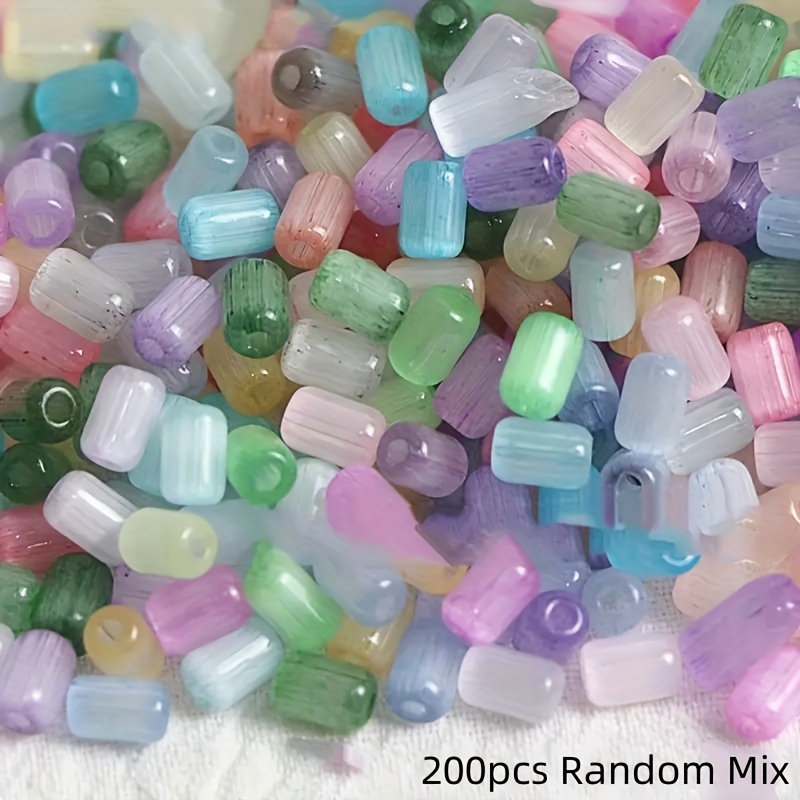 TEMU 400pcs/200pcs Mélange Aléatoire Perles de Verre de Poire Œil de Chat Série Mille Couleurs de Haute Qualité 4x6mm - Multicolores Brillantes,