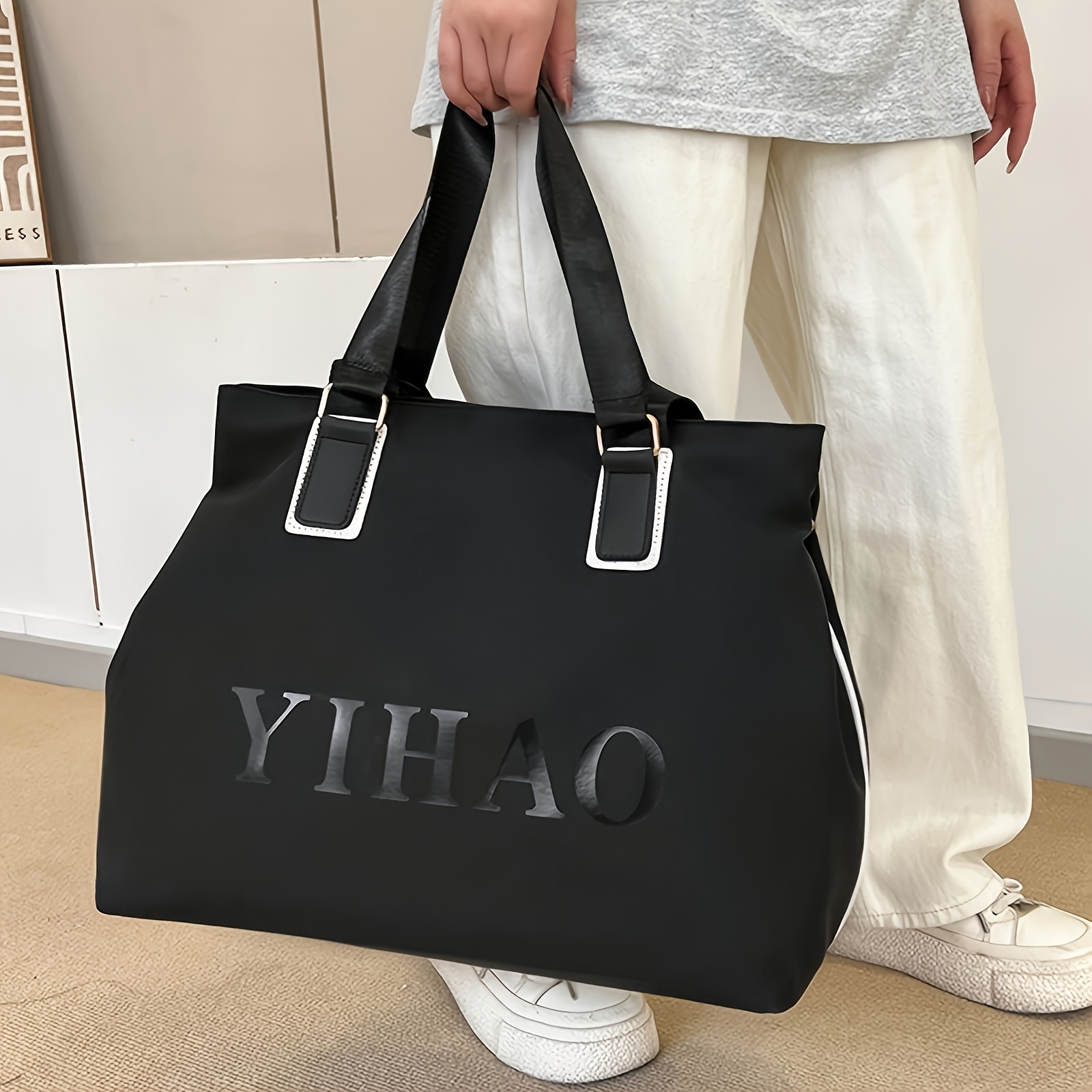 E-shop Stilvolle große schwarze Nylon-Tragetasche mit weißen Akzenten – Langlebige Schulterhandtasche & Reisetasche mit Reißverschluss für Damen,