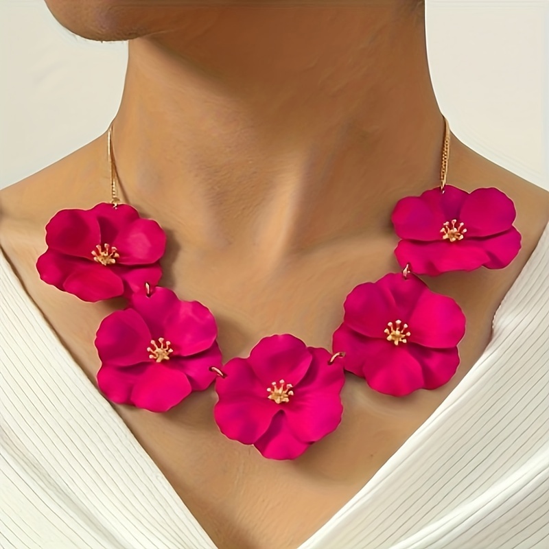 

A Stylish Women's Pendant Necklace With A Fuchsia Flower, Perfect As A Gift For A Date.