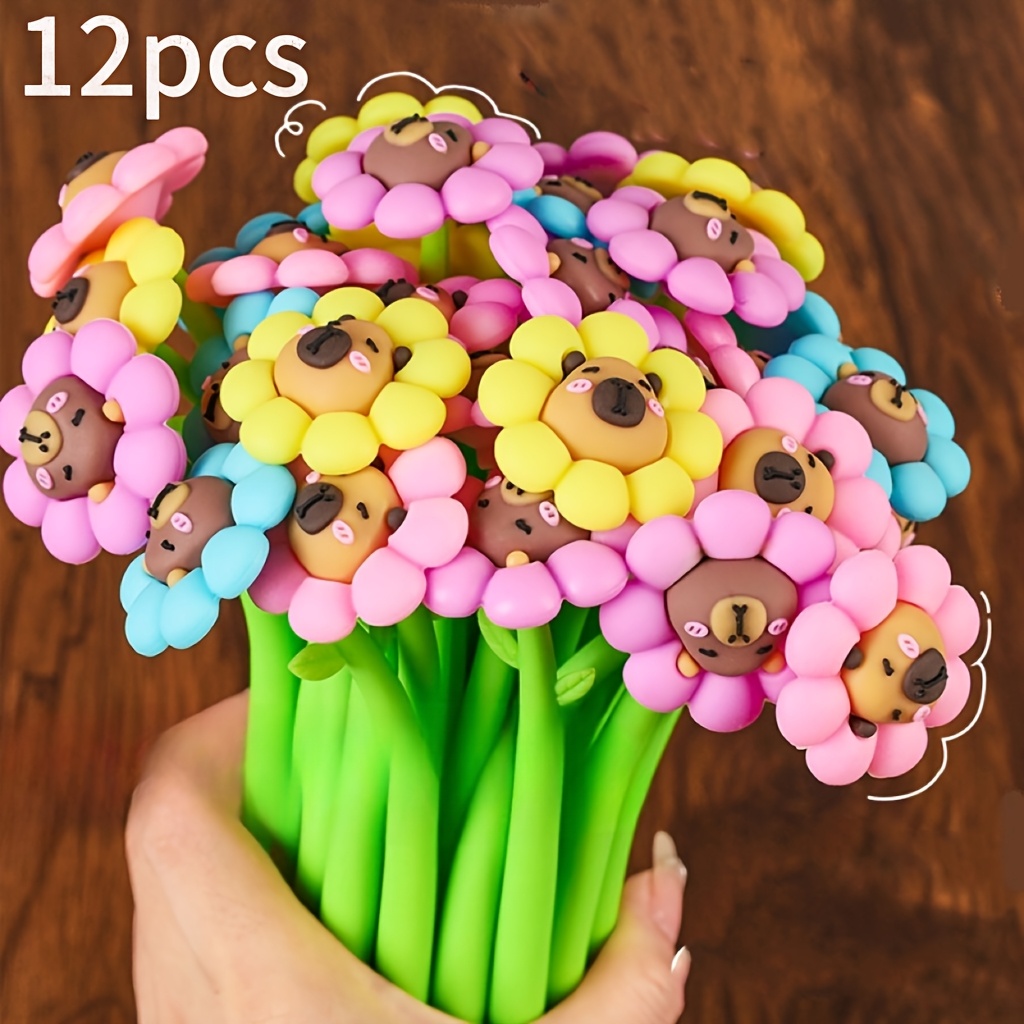 12pcs Random Style Sunflower Dolphin Swinging Pens, With Random Color Patterns. Pens Are For Student Writing And…: retailer-supplied image