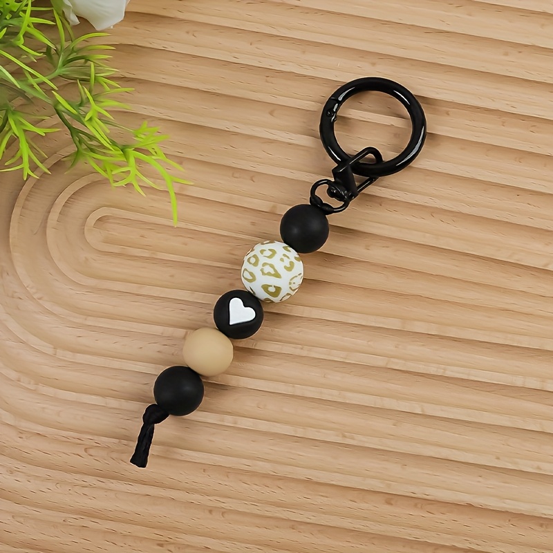 TEMU A Heart-shaped Leopard Print Beaded Keychain With A Sweet And , Featuring A Blend Of Colorful Beads And Leopard Print Elements, With A Delicate