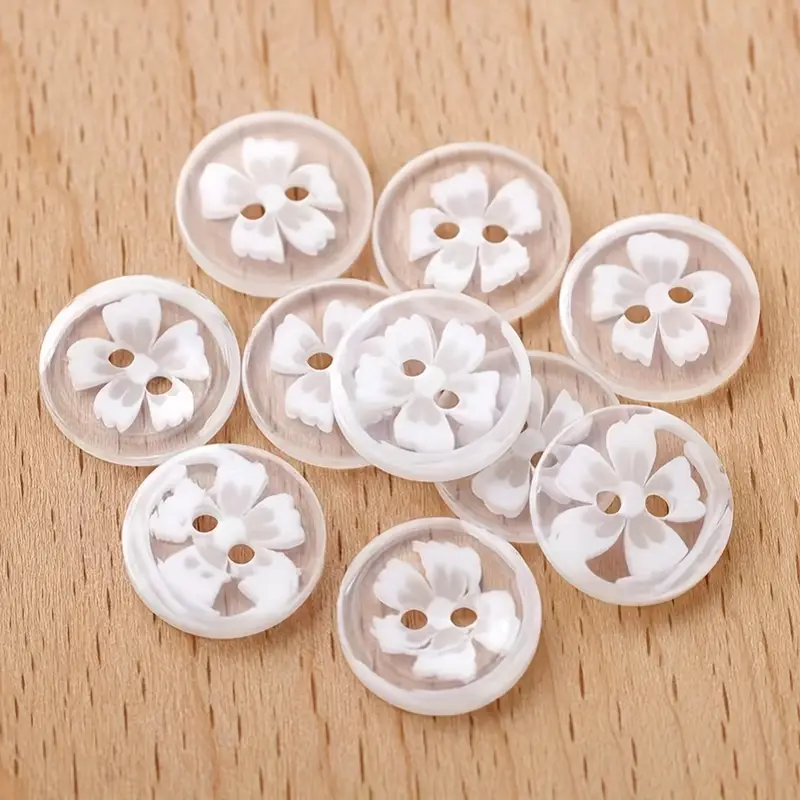2 Hole Button: 6 Petal Flower: 14mm - White 2 Hole Button: 6 Petal Flower: 14mm - White